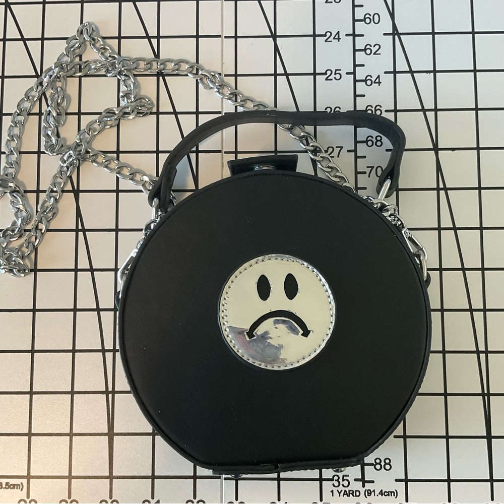 delias frowny chain crossbody bag